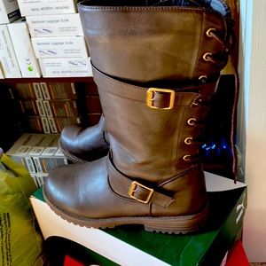 Brown knee high boots.